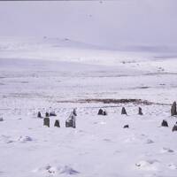 Snow scene of White Moor stone circle at Widecombe in the Moor 