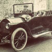 Uncatalogued: Percy Peters in his car at the rear of Bovey Stores.jpg