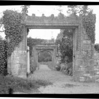 Ornately carved gateway. Location unknown.