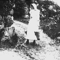 Phyllis Collett, milkmaid, at Foxworthy, 1907