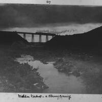 Steam train crossing Meldon Viaduct