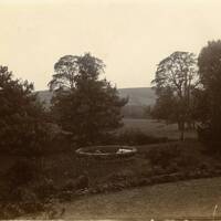 Hele House; Looking across the garden fountain towards Dartmoor