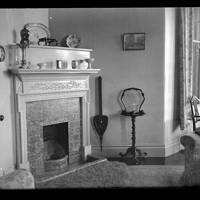 Fireplace in the drawing room at Gratton 