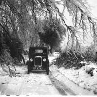 The Clements Delivering Newspapers in Their Austin 7 During the Great Blizzard of 1947
