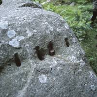 Feather & tare holes in granite