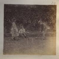 Children playing croquet