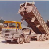 Scammell lorry tipping raw clay product to factory