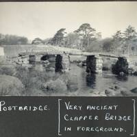 Postbridge - very ancient clapper bridge in foreground.
