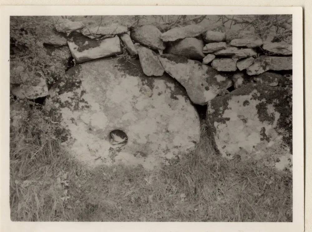 Mill stone set in wall at Teigncombe