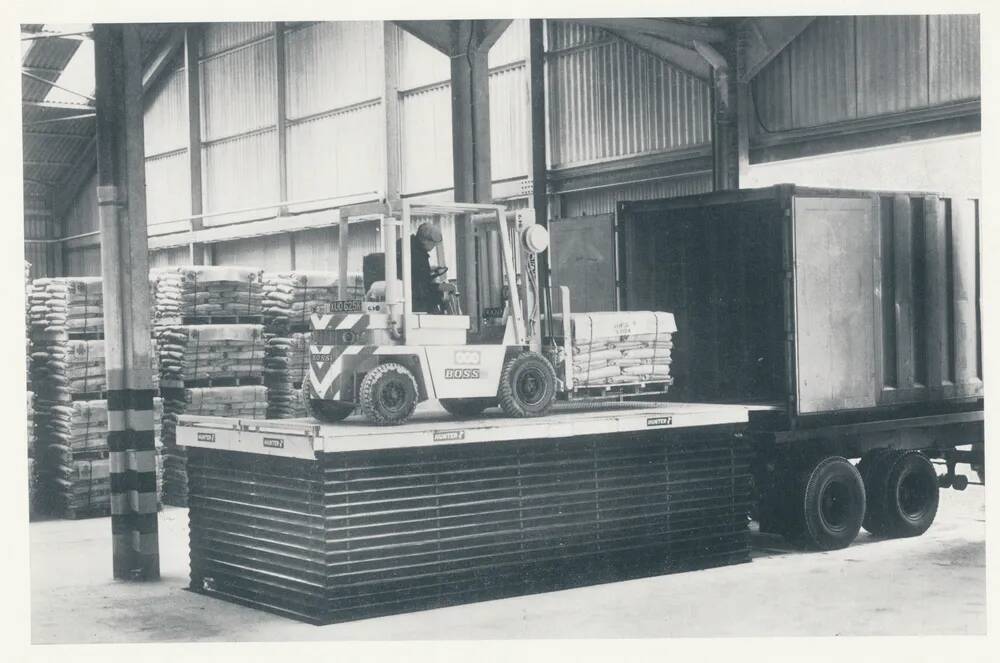 WBB Storage shed, loading palettes of building materials into back of lorry