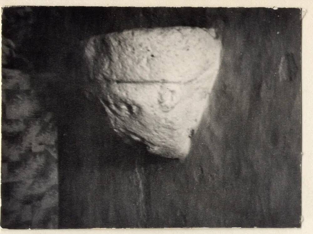 Carved stone in the wall of Church House at Walkhampton