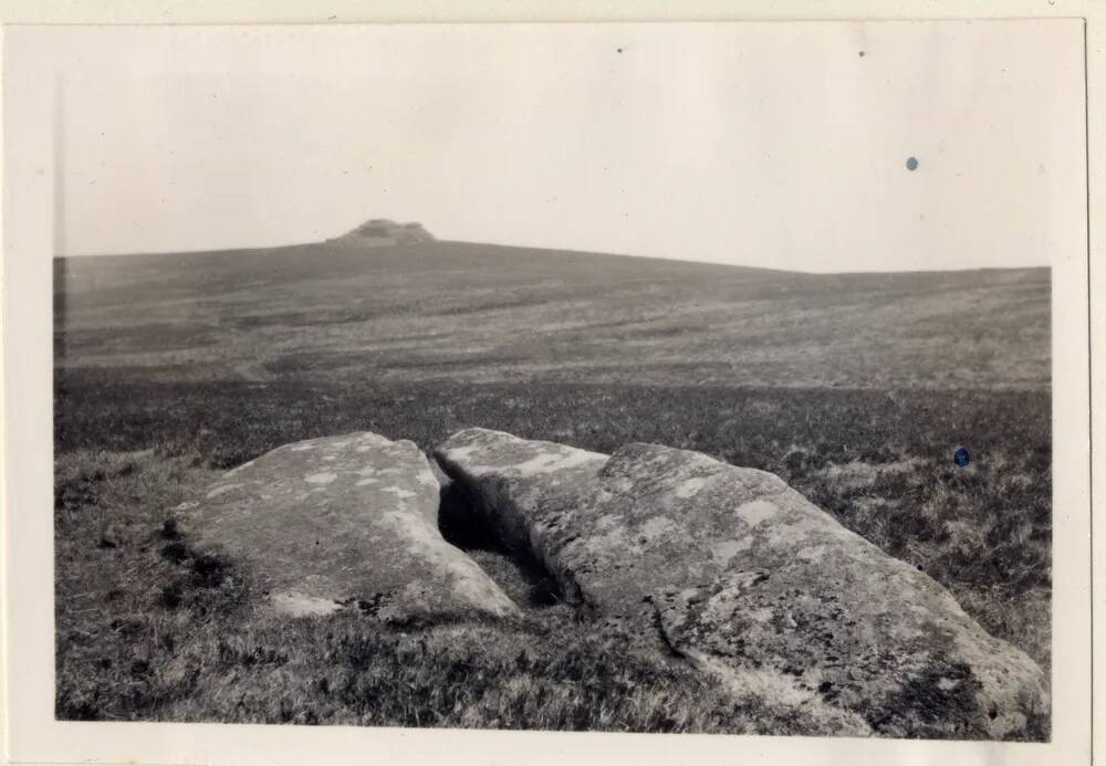 Recumbent menhir at Shuggledown, with Kes Tor in background